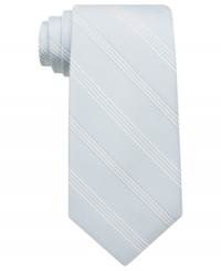 Subtle plaid on this Perry Ellis skinny tie adds just the right amount of polish for a crisp look you can take from the desk to dinner. Subtle plaid on this Perry Ellis skinny tie adds just the right amount of polish for a crisp look you can take from the desk to dinner.