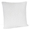 Frill trim and delicate embroidery accent this decorative pillow from DKNY.