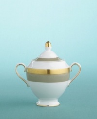 This simple, handsome pattern dates from the 18th century and serves as a perfect tabletop complement. The color palette of Martha Stewart's Bedford, home inspired this version of Wedding Band, with its many accents of gilt and matte gold. One of her favorite services, it charms with its perfectly proportioned taupe rims coupled to burnished ribbons of gold, and partners with more elaborate serving pieces to dress up tables for festive, formal evenings. This simple, handsome pattern dates from the 18th century and serves as a perfect tabletop complement. The color palette of Martha Stewart's Bedford, home inspired this version of Wedding Band, with its many accents of gilt and matte gold. One of her favorite services, it charms with its perfectly proportioned taupe rims coupled to burnished ribbons of gold, and partners with more elaborate serving pieces to dress up tables for festive, formal evenings.
