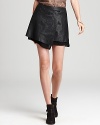 No woman should be without a chic leather mini in her closet--we suggest this Joie skirt--a natural-born stunner who's tame enough for the office but always up for a party.