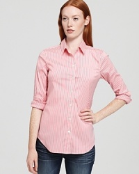 A tailored essential with slim, sophisticated stripes, this button-down Theory shirt, is a timeless wear-to-work look that moonlights on weekends with denim. A tailored essential with slim, sophisticated stripes, this button-down Theory shirt, is a timeless wear-to-work look that moonlights on weekends with denim.