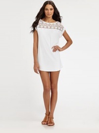 A striking coverup featuring a gorgeous lace top and an easy fit.Round neckShort sleevesLace front and back yokeFeminine, curved hemPull-on style92% rayon/8% spandexDry cleanImported of domestic fabric A striking coverup featuring a gorgeous lace top and an easy fit.Round neckShort sleevesLace front and back yokeFeminine, curved hemPull-on style92% rayon/8% spandexDry cleanImported of domestic fabric