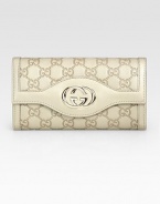 Rich, logo-stamped metallic leather in foldover silhouette topped with GG hardware.Magnetic snap flap pocketCenter zip pocketTwo inner compartmentsTwelve credit card slotsFully lined7½W X 4H X 1¼DMade in Italy