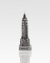 The iconic form of New York's Empire State Building appears to be dusted with sugar in this glittering glass creation to hang on your tree.Handmade and hand-paintedGlassAbout 6.5H X 1.5W X 1.25DImported