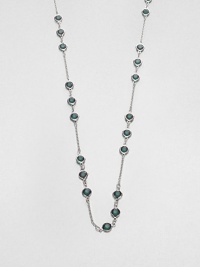 From the Black Tie Optional Collection. A long-enough-to-double chain is dotted with trios of faceted green stones in this graceful variation on a classic design.Glass and plasticSilvertoneLength, about 48Lobster claspImported