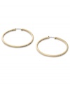 These timeless hoop earrings from Fossil get a glitzy upgrade with black diamond crystal accents. Crafted in shiny gold tone mixed metal. Approximate diameter: 2 inches.