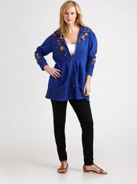 Featuring embroidery, this hoodie would be a stylish addition to any wardrobe. The peplum waist is ultra-feminine and flattering.Attached hoodLong sleevesFront zipperAbout 32 from shoulder to hemCottonMachine washImported