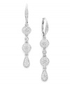 Dramatic and dazzling. Eliot Danori's sparkling earrings style features round and pear-shaped drops encrusted with pave-set crystals. Set in silver tone mixed metal. Approximate drop: 1-1/2 inches.