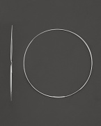 14 Kt. white gold hoop earrings with invisible closure.