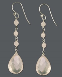 Shine from every angle. These faceted drops feature shimmery rose quartz (17-1/10 ct. t.w.) in a delicate sterling silver setting. Approximate drop: 2-1/4 inches. Shine from every angle. These faceted drops feature shimmery rose quartz (17-1/10 ct. t.w.) in a delicate sterling silver setting. Approximate drop: 2-1/4 inches.