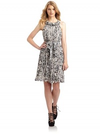 THE LOOKAbstract brushstroke print on crinkled silk georgetteRuffled neckSleevelessSash ties around the waistBack zipper with hook-and-eye closureTHE FITAbout 37 from shoulder to hemTHE MATERIALViscose/rayonCARE & ORIGINDry cleanImportedModel shown is 5'10 (177cm) wearing US size 4. THE LOOKAbstract brushstroke print on crinkled silk georgetteRuffled neckSleevelessSash ties around the waistBack zipper with hook-and-eye closureTHE FITAbout 37 from shoulder to hemTHE MATERIALViscose/rayonCARE & ORIGINDry cleanImportedModel shown is 5'10 (177cm) wearing US size 4.