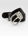 Polished, oval palladium-plated buckle, defines this reversible leather design with removable buckle, available in an extra-long size that you may tailor to fit your style and needs.LeatherAbout 1¼ wideImported