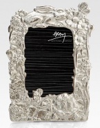 A nostalgic reminder of youth and fairytale lore, this hand-cast design of nickel-plated metal is sure to inspire story-telling for years to come.From the Baby Heirloom CollectionNickel-plated metalConvertible frame fits 4 X 6 or 5 X 7 photos10H X 7WImported