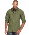 This Rocawear button down has a military-style design and sleek modern fit.