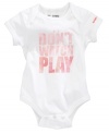 She's never too young to be inspired. This Under Armour bodysuit encourages her to go for the goal.