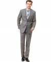 In a cool gray palette, this sleek trim-fit suit from DKNY lightens your look while maintaining strength and sophistication.