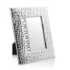 Featuring a wide crocodile-patterned border in gleaming plated silver, this unique frame by Argento gives favorite photos a fresh, modern look.