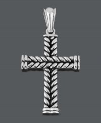 Express your faith in Celtic-inspired design. This remarkable cross pendant features a unique, braided design. Crafted in stainless steel with matching ball chain. Approximate length: 24 inches. Approximate drop width: 1-1/2 inches. Approximate drop length: 2-1/10 inches. Express your faith in Celtic-inspired design. This remarkable cross pendant features a unique, braided design. Crafted in stainless steel with matching ball chain. Approximate length: 24 inches. Approximate drop width: 1-1/2 inches. Approximate drop length: 2-1/10 inches.