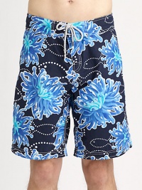 A sea-inspired print full of color and charm accents these classic-fitting swim trunks, in quick-drying nylon, for superior comfort and style.Drawstring waistInseam, about 10PolyamideMachine washImported A sea-inspired print full of color and charm accents these classic-fitting swim trunks, in quick-drying nylon, for superior comfort and style.Drawstring waistInseam, about 10PolyamideMachine washImported