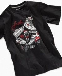 He'll love kicking it in this tee covered in kicks. This Nike shirt features a collection of b-ball sneakers and fresh logo. He'll love kicking it in this tee covered in kicks. This Nike shirt features a collection of b-ball sneakers and fresh logo.