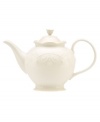 With fanciful beading and a feminine edge, this Lenox French Perle teapot is a great addition to your white dinnerware and has an irresistibly old-fashioned sensibility. Hard-wearing stoneware is dishwasher safe and, in a soft white hue, a graceful addition to any meal.