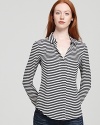 Black, white and striped all over, this wispy silk Theory shirt, is our top pick for elegant-ease this season.