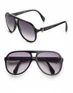 An edgy acetate design with Swarovski crystal embellished skull details at the temples. Available in black with gray gradient lens. Logo temples 100% UV protection Made in Italy 