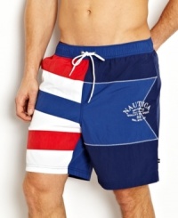 Fly the flag. These color-block board shorts from Nautica are beach-worthy trunks to take you into the surf in comfort. Fly the flag. These color-block board shorts from Nautica are beach-worthy trunks to take you into the surf in comfort.