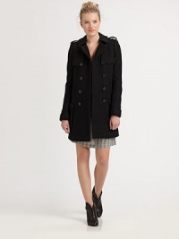 A classic double-breasted silhouette, styled with oversized flap pockets, all in rich blended wool.Notch collarEpaulettesChest pocketsGun flapsButton frontWelt pocketsFlat pocketsInverted back pleatAbout 32 from shoulder to hem70% wool/30% nylonDry cleanImportedModel shown is 5'10 (177cm) wearing US size Small. A classic double-breasted silhouette, styled with oversized flap pockets, all in rich blended wool.Notch collarEpaulettesChest pocketsGun flapsButton frontWelt pocketsFlat pocketsInverted back pleatAbout 32 from shoulder to hem70% wool/30% nylonDry cleanImportedModel shown is 5'10 (177cm) wearing US size Small.