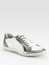 A sharply-defined look in metallic nylon with suede detail and a debossed logo on the side. Leather lining Padded insole Rubber sole Imported A sharply-defined look in metallic nylon with suede detail and a debossed logo on the side. Leather lining Padded insole Rubber sole Imported