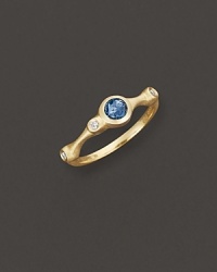 A faceted blue topaz and brilliant diamonds add bright color to gleaming 18K yellow gold. By Carelle. A faceted blue topaz and brilliant diamonds add bright color to gleaming 18K yellow gold. By Carelle.
