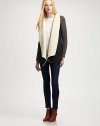 Modern take on the classic coat, this suede like design is styled with contrasting knit sleeves and plush faux shearling trim. Faux shearling shawl collarLong knit sleevesAdjustable back cordFaux shearling liningBody: PolyesterTrim: 50% acrylic/30% wool/20% nylonHand washImportedModel shown is 5'10 (177cm) wearing US size Small.