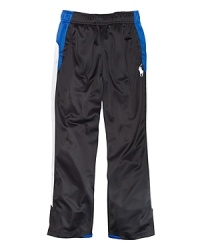 Ralph Lauren's iconic pony accents a pair of active pants with bold contrast stripes down the legs for superior game-time style. Ralph Lauren's iconic pony accents a pair of active pants with bold contrast stripes down the legs for superior game-time style.