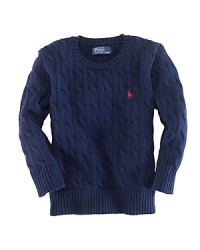 A classic cable crewneck sweater will keep your little one warm with its soft cotton. A classic cable crewneck sweater will keep your little one warm with its soft cotton.
