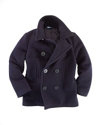 The essential pea coat in luxuriously soft wool is classically rendered for a timeless appeal. The essential pea coat in luxuriously soft wool is classically rendered for a timeless appeal.