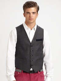 A dapper and distinguished element of any tailored wardrobe is infused with color an character, featuring an argyle-print pattern on the back, rendered in a blend of superior wool and cashmere for a luxurious finish.Button-frontChest, waist welt pockets95% wool/5% cashmereDry cleanMade in Italy