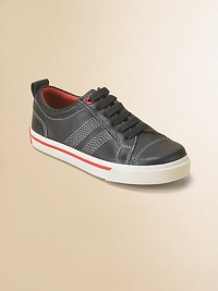 A sleek, streamlined sturdy sneaker of rich leather with a lace-up front and perforated padded collar for extra comfort.Leather upperLace-up frontDecorative stitchingFully linedRubber composite soleNike Air technologyImported A sleek, streamlined sturdy sneaker of rich leather with a lace-up front and perforated padded collar for extra comfort.Leather upperLace-up frontDecorative stitchingFully linedRubber composite soleNike Air technologyImported