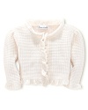 Pointelle ruffles decorate a flat-knit cotton cardigan with sweet, timeless charm.