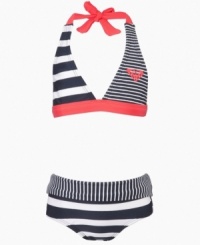 Surfer style. This two-piece swimsuit from Roxy mixes up the patterns for a summer beach look that will be a hit. Surfer style. This two-piece swimsuit from Roxy mixes up the patterns for a summer beach look that will be a hit.