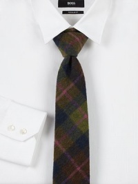 Updated dress staple for the modern man, handwoven with a rich plaid pattern in fine wool.WoolDry cleanMade in USA