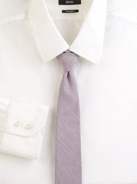Streamlined, slim plaid design adds a modern touch to your classic wardrobe essentials.CottonDry cleanMade in USA Streamlined, slim plaid design adds a modern touch to your classic wardrobe essentials.CottonDry cleanMade in USA