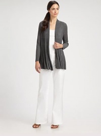 Delicate pleats lend a feminine touch to this finespun knit design.Open frontLong sleevesRib-knit bandAllover pleatsAbout 29 from shoulder to hem84% viscose/16% nylonDry cleanImported of Italian fabricModel shown is 5'11 (180cm) wearing US size Small. Delicate pleats lend a feminine touch to this finespun knit design.Open frontLong sleevesRib-knit bandAllover pleatsAbout 29 from shoulder to hem84% viscose/16% nylonDry cleanImported of Italian fabricModel shown is 5'11 (180cm) wearing US size Small.