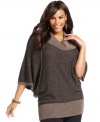 Stay warm and fashionable this season with Style&co.'s dolman sleeve plus size sweater, finished by a cowl neckline.