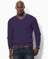 A long-sleeved sweater is designed in luxurious jersey-knit Pima cotton with a preppy V-neckline for refined, masculine polish. A long-sleeved sweater is designed in luxurious jersey-knit Pima cotton with a preppy V-neckline for refined, masculine polish.
