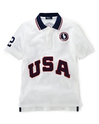 A breathable cotton mesh polo is accented with bold country embroidery, celebrating Team USA's participation in the 2012 Olympics. A breathable cotton mesh polo is accented with bold country embroidery, celebrating Team USA's participation in the 2012 Olympics.