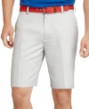 Show off your gams as you keep your legs cool in these solid flat front shorts by Izod.