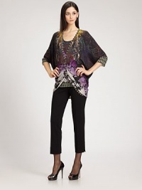 Finespun wool blended with a hint of cashmere for extra softness, in a sculptural silhouette printed with a vibrant paisley-inspired pattern.V necklineThree-quarter dolman sleevesButton frontFront tucksAbout 30 from shoulder to hem55% silk/45% cashmereDry cleanMade in ItalyModel shown is 5'11 (180cm) wearing US size 4. Finespun wool blended with a hint of cashmere for extra softness, in a sculptural silhouette printed with a vibrant paisley-inspired pattern.V necklineThree-quarter dolman sleevesButton frontFront tucksAbout 30 from shoulder to hem55% silk/45% cashmereDry cleanMade in ItalyModel shown is 5'11 (180cm) wearing US size 4.