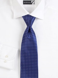 Elegant silk design with an allover mini-print finish.SilkDry cleanMade in Italy Elegant silk design with an allover mini-print finish.SilkDry cleanMade in Italy