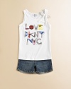 She'll heart NYC when she pulls on this soft, rocker chic top with sweet bow and silver accentsScoopneckSleevelessPullover style60% cotton/40% polyesterMachine washImported