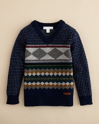 We love the warm combination of diamonds, stripes and dot patterns on this soft lambswool sweater from Burberry. We love the warm combination of diamonds, stripes and dot patterns on this soft lambswool sweater from Burberry.